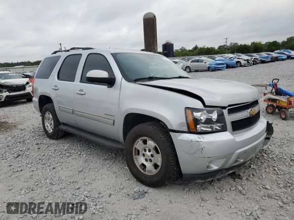 2013 Chevrolet Tahoe LT with VIN 1GNSCBE06DR101654, listed as a Copart auction lot 68192175 with 299,597 mi miles and Salvage title. Bid and sale history available at DreamBid. Image 4.