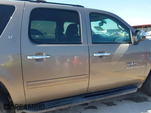 2011 Chevrolet Suburban LT with VIN 1GNSCJE03BR396610, listed as a IAAI auction lot 42348029 with 249,280 mi miles and . Bid and sale history available at DreamBid. Image 13.