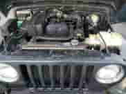 2005 Jeep Wrangler SE z VIN 1J4FA29155P363501, wystawiony jako Copart lot #80388314 z przebiegiem 97 564 mil mil oraz Czysty tytuł • Clean title. Historia ofert i sprzedaży dostępna na DreamBid. Obrazek 11.