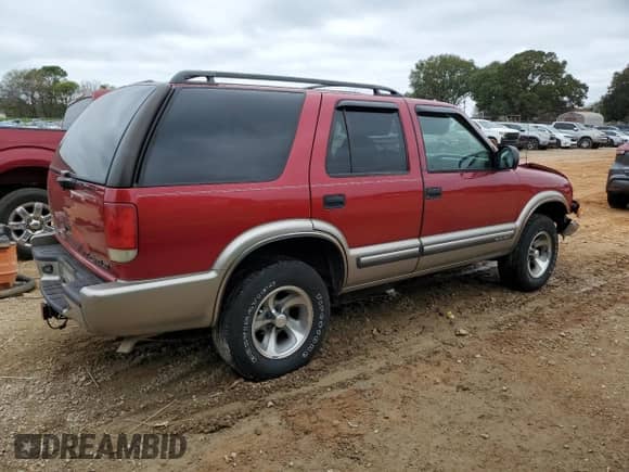 2000 Chevrolet Blazer LT with VIN 1GNCS13W3Y2213772, listed as a Copart auction lot 79964794 with 80,090 mi miles and Salvage title. Bid and sale history available at DreamBid. Image 3.