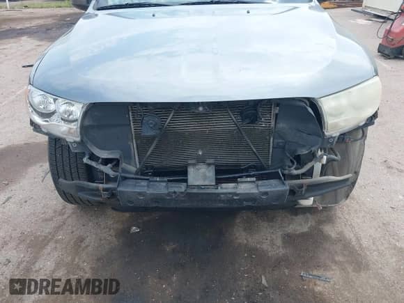 2012 Dodge Durango SXT with VIN 1C4RDJAG9CC181275, listed as a IAAI auction lot 42760696 with 211,805 mi miles and . Bid and sale history available at DreamBid. Image 6.