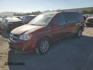 2019 Dodge Grand Caravan SXT with VIN 2C4RDGCG7KR582040, listed as a Copart auction lot 80749955 with 76,723 mi miles and Salvage title. Bid and sale history available at DreamBid. Image 1.