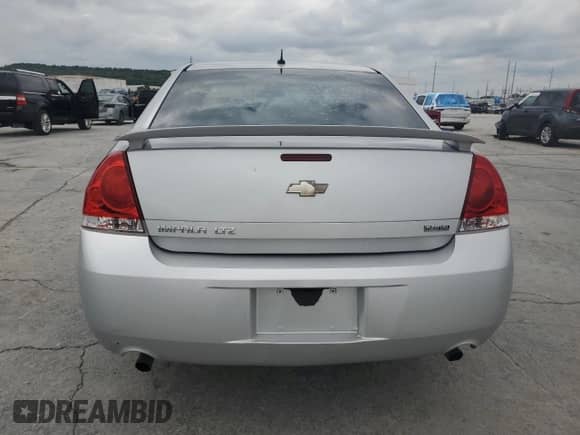 2013 Chevrolet Impala LTZ z VIN 2G1WC5E31D1234636, wystawiony jako Copart lot #81733505 z przebiegiem 225 585 mil mil oraz Szkoda całkowita • Salvage title. Historia ofert i sprzedaży dostępna na DreamBid. Obrazek 6.