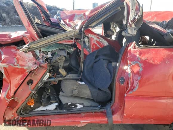 2001 Chevrolet Blazer LS z VIN 1GNCT18W21K218859, wystawiony jako Copart lot #88841755 z przebiegiem Nie podano mil oraz Nie do naprawy • Non repairable. Historia ofert i sprzedaży dostępna na DreamBid. Obrazek 7.