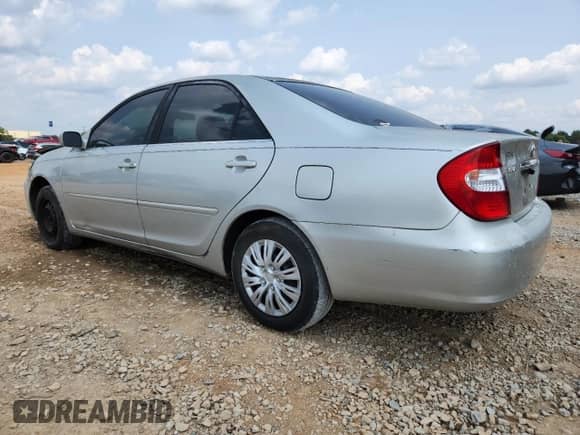 2003 Toyota Camry LE with VIN 4T1BE32K13U156261, listed as a Copart auction lot 71731545 with 267,857 mi miles and Salvage title. Bid and sale history available at DreamBid. Image 2.