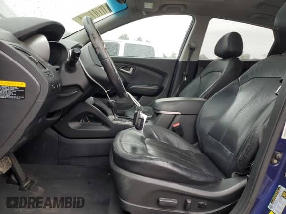 2013 Hyundai Tucson GLS z VIN KM8JU3AC4DU567888, wystawiony jako Copart lot #85600625 z przebiegiem 135 558 mil mil oraz Szkoda całkowita • Salvage title. Historia ofert i sprzedaży dostępna na DreamBid. Obrazek 7.