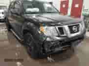 2009 Nissan Frontier SE with VIN 1N6AD07U59C401327, listed as a IAAI auction lot 41591067 with 203,043 mi miles and . Bid and sale history available at DreamBid. Image 6.