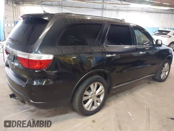2013 Dodge Durango Crew with VIN 1C4RDJDG2DC670338, listed as a IAAI auction lot 42434949 with 176,202 mi miles and . Bid and sale history available at DreamBid. Image 4.