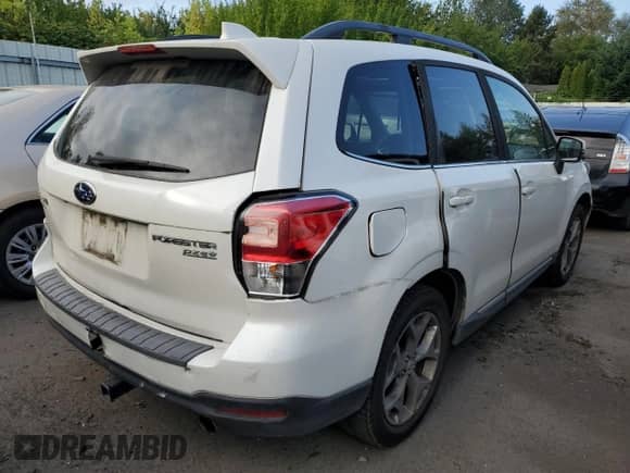 2017 Subaru Forester Touring with VIN JF2SJATC6HH419700, listed as a Copart auction lot 71716425 with 138,226 mi miles and Salvage title. Bid and sale history available at DreamBid. Image 3.