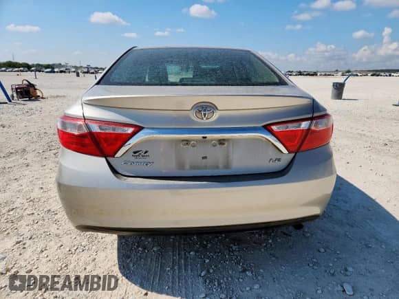 2016 Toyota Camry LE с VIN 4T4BF1FK1GR518001, выставлен на аукционе Copart как лот 85900895 с пробегом 251 627 миль миль и Списание • Salvage title. История ставок и продаж доступна на DreamBid. Изображение 6.