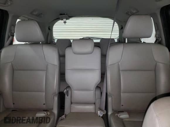2013 Honda Odyssey Touring с VIN 5FNRL5H90DB044358, выставлен на аукционе Copart как лот 83942565 с пробегом 196 999 миль миль и Списание • Salvage title. История ставок и продаж доступна на DreamBid. Изображение 10.
