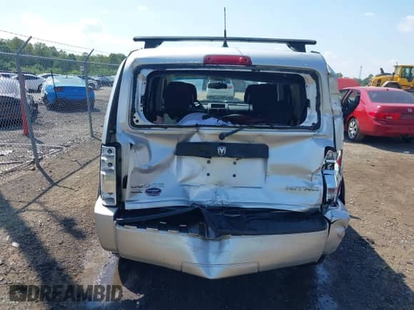 2011 Dodge Nitro Heat with VIN 1D4PT4GX5BW500318, listed as a IAAI auction lot 42602440 with 163,836 mi miles and . Bid and sale history available at DreamBid. Image 16.