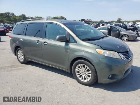 2012 Toyota Sienna XLE with VIN 5TDYK3DC8CS176623, listed as a Copart auction lot 80257225 with 262,472 mi miles and Salvage title. Bid and sale history available at DreamBid. Image 4.