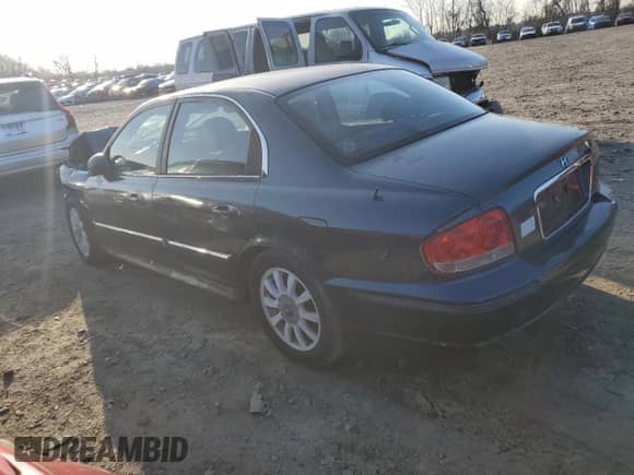 2002 Hyundai Sonata GLS z VIN KMHWF35H62A567458, wystawiony jako Copart lot #84374214 z przebiegiem Nie podano mil oraz Szkoda całkowita • Salvage title. Historia ofert i sprzedaży dostępna na DreamBid. Obrazek 2.