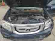 2009 Honda Pilot Touring with VIN 5FNYF48999B016322, listed as a Copart auction lot 71404925 with 205,468 mi miles and Salvage title. Bid and sale history available at DreamBid. Image 12.