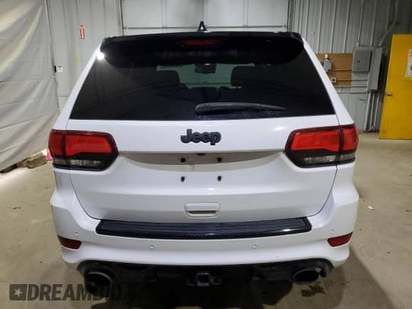 2016 Jeep Grand Cherokee SRT with VIN 1C4RJFDJ4GC503890, listed as a Copart auction lot 86642835 with 77,353 mi miles and Clean title. Bid and sale history available at DreamBid. Image 6.
