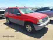 1996 Jeep Grand Cherokee Laredo z VIN 1J4GZ58Y5TC183677, wystawiony jako IAAI lot #42582989 z przebiegiem 187 453 mil mil oraz . Historia ofert i sprzedaży dostępna na DreamBid. Obrazek 1.