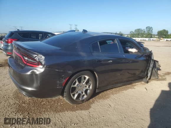 2015 Dodge Charger SXT with VIN 2C3CDXJG3FH742701, listed as a Copart auction lot 71244325 with Not provided miles and Salvage title. Bid and sale history available at DreamBid. Image 3.