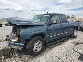 2006 Chevrolet Silverado 1500 LS with VIN 1GCEC19T06Z265487, listed as a Copart auction lot 84657485 with 296,656 mi miles and Salvage title. Bid and sale history available at DreamBid. Image 1.