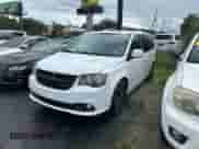 2014 Dodge Grand Caravan SXT with VIN 2C4RDGCG6ER412434, listed as a Copart auction lot 86316495 with 144,803 mi miles and Clean title. Bid and sale history available at DreamBid. Image 2.