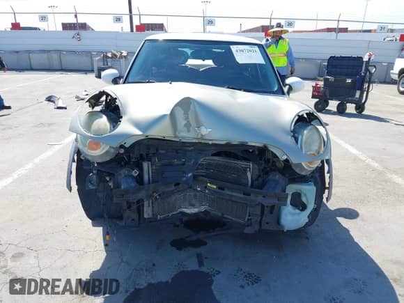 2007 MINI Hardtop with VIN WMWMF33537TT55761, listed as a IAAI auction lot 43072021 with 190,545 mi miles and . Bid and sale history available at DreamBid. Image 6.