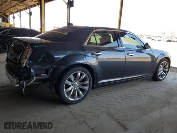 2015 Chrysler 300 C with VIN 2C3CCAET9FH899379, listed as a Copart auction lot 54428885 with 88,012 mi miles and Salvage title. Bid and sale history available at DreamBid. Image 3.