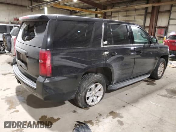2015 Chevrolet Tahoe Commercial with VIN 1GNSK2EC4FR718793, listed as a Copart auction lot 84749724 with 122,342 mi miles and Salvage title. Bid and sale history available at DreamBid. Image 3.