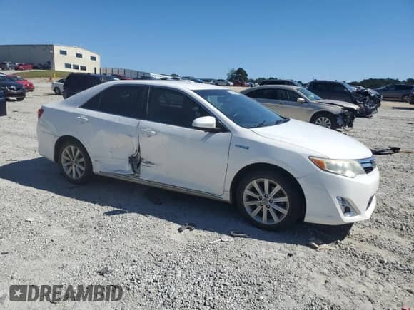 2012 Toyota Camry XLE z VIN 4T1BD1FK8CU022512, wystawiony jako Copart lot #82413865 z przebiegiem Nie podano mil oraz Szkoda całkowita • Salvage title. Historia ofert i sprzedaży dostępna na DreamBid. Obrazek 4.