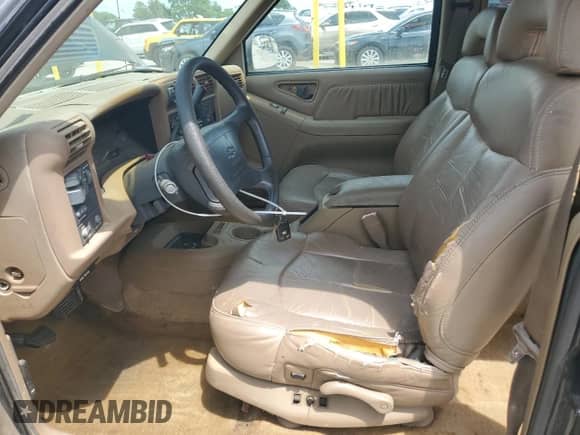 1996 Chevrolet Blazer with VIN 1GNDT13W8T2222722, listed as a Copart auction lot 65243055 with 195,725 mi miles and Salvage title. Bid and sale history available at DreamBid. Image 7.