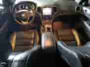 2017 Jeep Grand Cherokee Overland with VIN 1C4RJFCT1HC755486, listed as a Copart auction lot 54852525 with 122,193 mi miles and Salvage title. Bid and sale history available at DreamBid. Image 8.