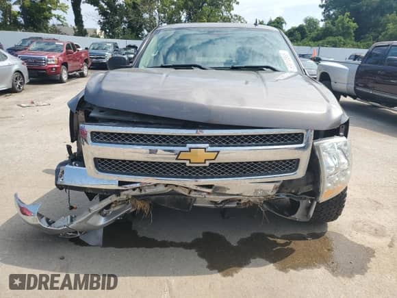 2012 Chevrolet Silverado 1500 LT с VIN 1GCRKSE71CZ341474, выставлен на аукционе Copart как лот 69010865 с пробегом Не указан миль и Списание • Salvage title. История ставок и продаж доступна на DreamBid. Изображение 5.