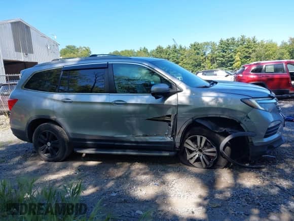 2016 Honda Pilot EX with VIN 5FNYF6H38GB090643, listed as a IAAI auction lot 43122683 with 86,063 mi miles and . Bid and sale history available at DreamBid. Image 13.