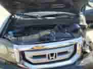 2011 Honda Pilot Touring with VIN 5FNYF3H9XBB041665, listed as a Copart auction lot 70728095 with 198,665 mi miles and Salvage title. Bid and sale history available at DreamBid. Image 12.