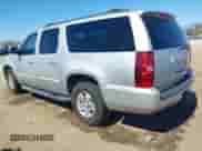 2010 Chevrolet Suburban LT z VIN 1GNUCJE04AR251342, wystawiony jako IAAI lot #42851505 z przebiegiem 243 731 mil mil oraz . Historia ofert i sprzedaży dostępna na DreamBid. Obrazek 3.