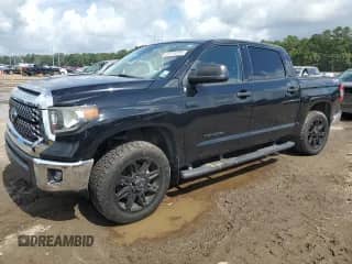 2020 Toyota Tundra SR5 with VIN 5TFDY5F14LX874306, listed as a Copart auction lot 63710755 with 119,449 mi miles and Salvage title. Bid and sale history available at DreamBid. Image 1.