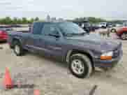 2001 Dodge Dakota z VIN 1B7GL22X91S341785, wystawiony jako Copart lot #90262095 z przebiegiem 164 468 mil mil oraz Szkoda całkowita • Salvage title. Historia ofert i sprzedaży dostępna na DreamBid. Obrazek 4.