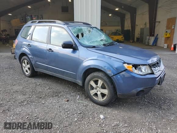 2011 Subaru Forester X z VIN JF2SHABC1BG711507, wystawiony jako Copart lot #64486475 z przebiegiem 173 037 mil mil oraz Szkoda całkowita • Salvage title. Historia ofert i sprzedaży dostępna na DreamBid. Obrazek 4.