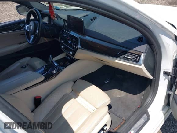 2018 BMW 5 Series 530i xDrive с VIN WBAJA7C50JG907628, выставлен на аукционе IAAI как лот 42646818 с пробегом 100 215 миль миль и . История ставок и продаж доступна на DreamBid. Изображение 5.