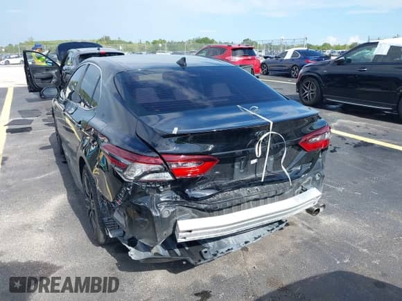 2023 Toyota Camry SE z VIN 4T1G11AK6PU774219, wystawiony jako IAAI lot #42733636 z przebiegiem 43 027 mil mil oraz . Historia ofert i sprzedaży dostępna na DreamBid. Obrazek 6.