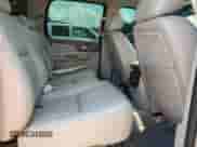 2011 Chevrolet Avalanche LTZ z VIN 3GNTKGE3XBG323125, wystawiony jako Copart lot #63481755 z przebiegiem 146 617 mil mil oraz Szkoda całkowita • Salvage title. Historia ofert i sprzedaży dostępna na DreamBid. Obrazek 10.