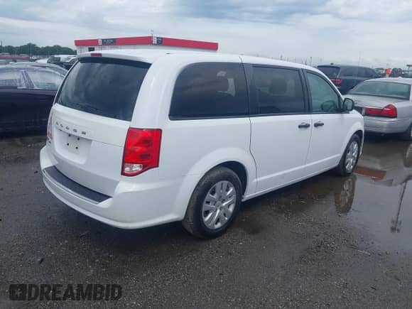 2020 Dodge Grand Caravan SE with VIN 2C4RDGBG5LR242825, listed as a IAAI auction lot 42086451 with 123,023 mi miles and . Bid and sale history available at DreamBid. Image 4.