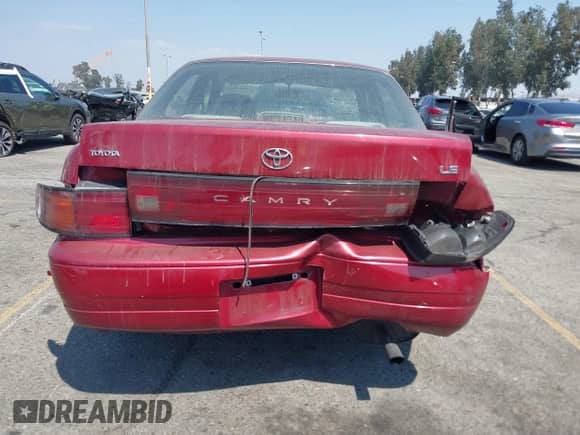 1994 Toyota Camry LE z VIN 4T1SK12E3RU361550, wystawiony jako IAAI lot #42975482 z przebiegiem 182 006 mil mil oraz . Historia ofert i sprzedaży dostępna na DreamBid. Obrazek 16.