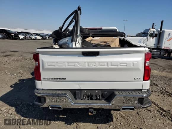 2023 Chevrolet Silverado 1500 LTZ with VIN 1GCUDGE82PZ236474, listed as a Copart auction lot 83958695 with 40,222 mi miles and Salvage title. Bid and sale history available at DreamBid. Image 6.