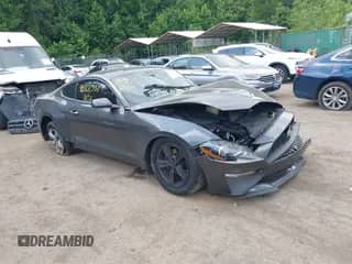 2020 Ford Mustang EcoBoost z VIN 1FA6P8TH0L5169275, wystawiony jako IAAI lot #42602351 z przebiegiem 73 326 mil mil oraz . Historia ofert i sprzedaży dostępna na DreamBid. Obrazek 1.