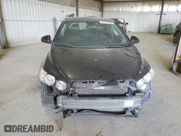 2013 Chevrolet Sonic RS z VIN 1G1JH6SB7D4222282, wystawiony jako Copart lot #53361875 z przebiegiem 85 963 mil mil oraz Szkoda całkowita • Salvage title. Historia ofert i sprzedaży dostępna na DreamBid. Obrazek 5.