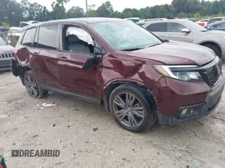 2021 Honda Passport EX-L with VIN 5FNYF7H52MB003340, listed as a IAAI auction lot 42871886 with 92,964 mi miles and . Bid and sale history available at DreamBid. Image 1.