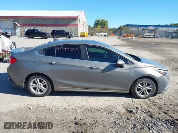 2017 Chevrolet Cruze LT with VIN 1G1BE5SM3H7188368, listed as a IAAI auction lot 43349399 with 215,246 mi miles and . Bid and sale history available at DreamBid. Image 13.