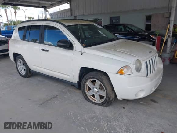 2008 Jeep Compass Sport with VIN 1J8FT47W78D661170, listed as a IAAI auction lot 43481804 with 179,362 mi miles and . Bid and sale history available at DreamBid. Image 1.
