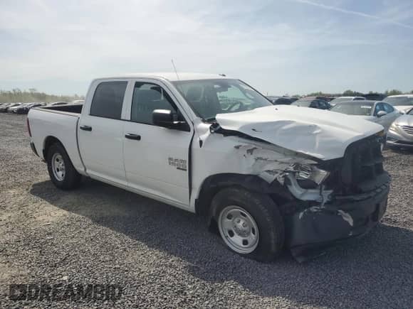 2022 Ram 1500 Tradesman with VIN 3C6RR6KG6NG205875, listed as a Copart auction lot 51427305 with 2,624 mi miles and Salvage title. Bid and sale history available at DreamBid. Image 4.