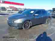 2014 Nissan Maxima SV with VIN 1N4AA5AP8EC458407, listed as a IAAI auction lot 41200395 with 158,507 mi miles and . Bid and sale history available at DreamBid. Image 17.